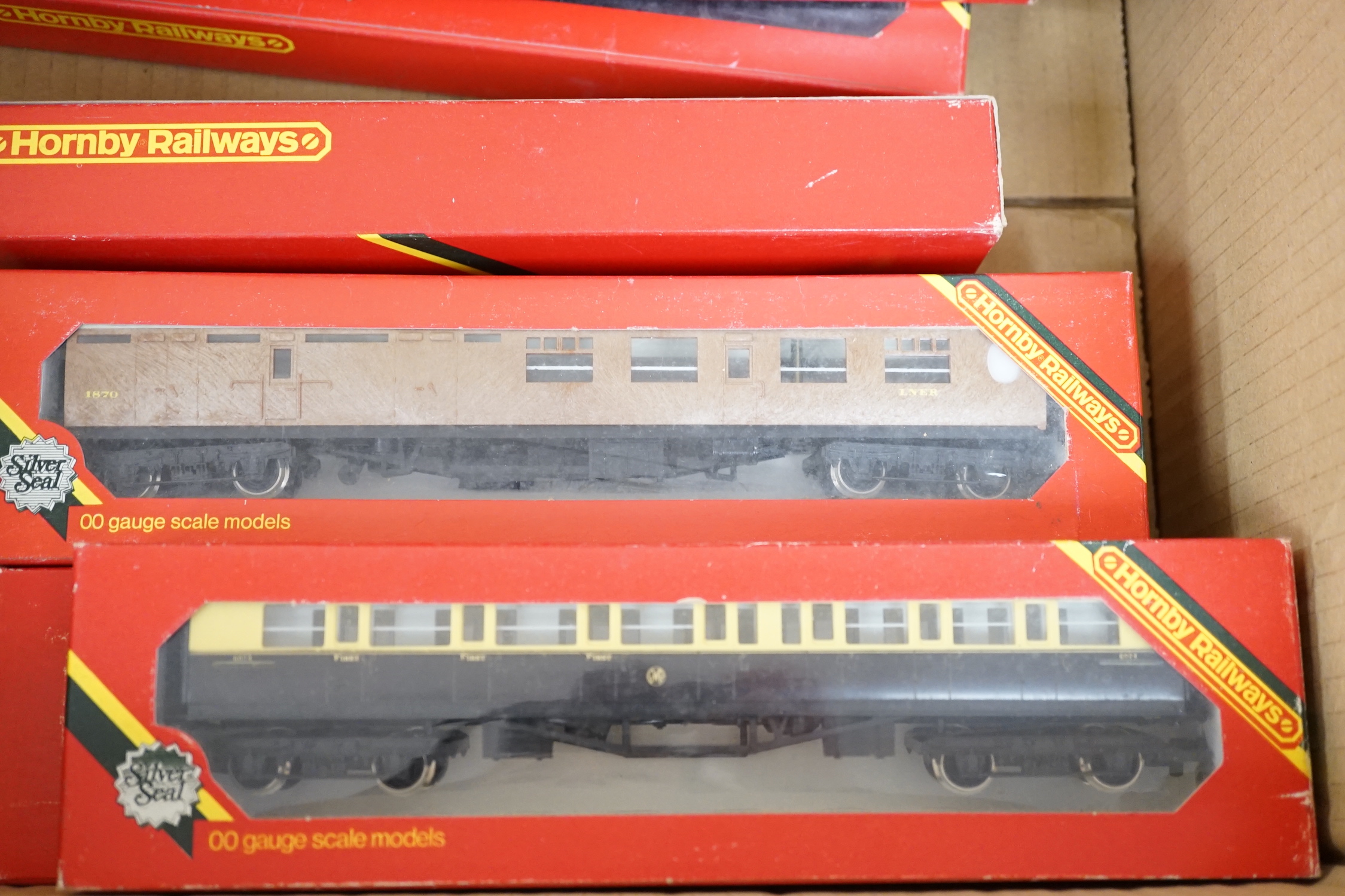 Fifteen boxed Hornby Railways 00 gauge items, including two locomotives; an LMS Class 5 (R842), and a BR Britannia Class (R063), together with thirteen bogie coaches; Pullman, LMS, SR, etc.